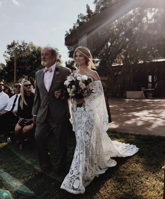 Molly and her father walk down the aisle on her big day (Autumn Nicole Walker )