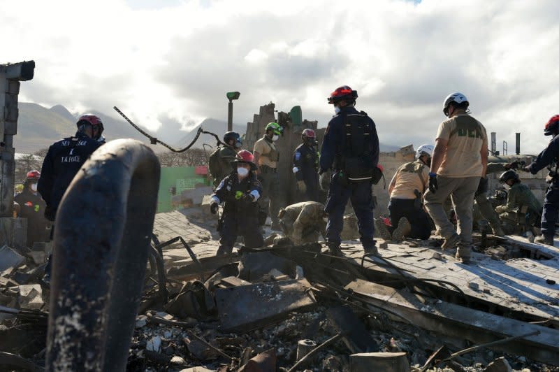 FEMA Urban Search and Rescue teams work with local fire departments and National Guard in Lahaina, Maui, on Wednesday. Photo by Dominick Del Vecchio/FEMA/UPI