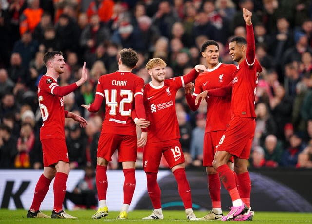 Cody Gakpo (right) celebrates scoring