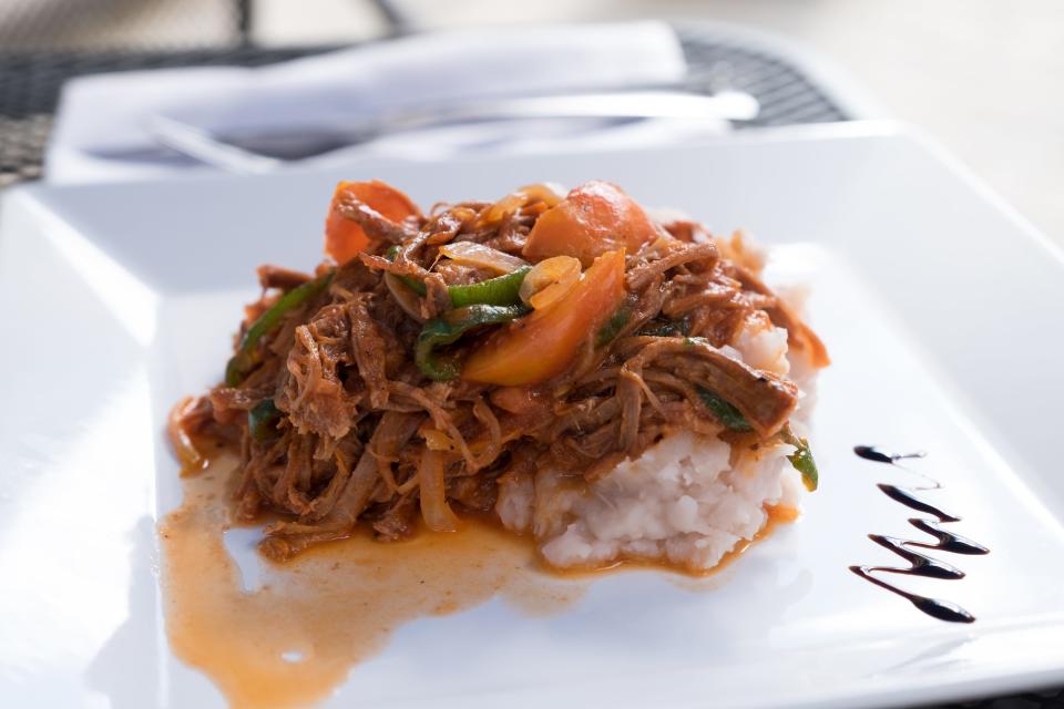 ropa vieja on a white plate