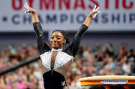 <p>Simone Biles wows the crowd after competing in the vault at the U.S. Gymnastics Championships in Fort Worth, Texas on June 6. </p>