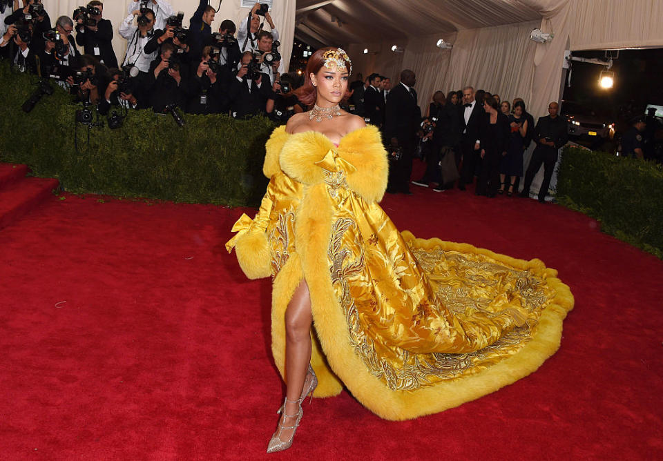 <p>If the Met Gala crowned a winner, Rihanna would been the leader by a long-shot. The singer, who also performed at the event, wore a yellow cape dress with a massive train from Chinese designer Guo Pei. The piece took two years to make by hand. (Photo: Getty Images) </p>