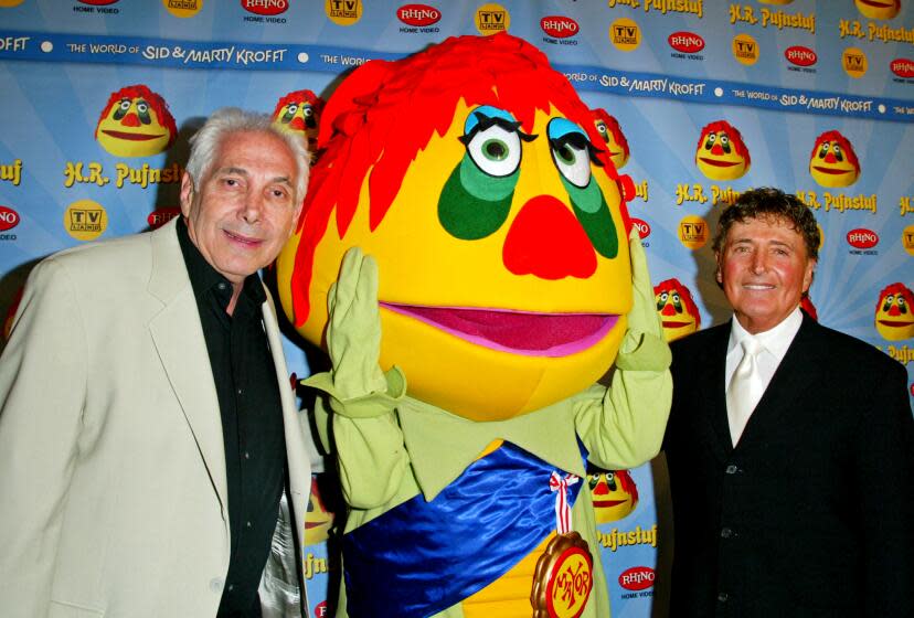 Marty Krofft, H.R. Pufnstuf and Sid Krofft (Photo by Donato Sardella/WireImage/Getty Images)