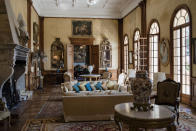 <p>Cushions rest on sofas of a sitting room inside the villa, which was built in 1830 and bought in 1850 by the mayor of Villefranche-sur-Mer, when it operated as an olive tree farm </p>