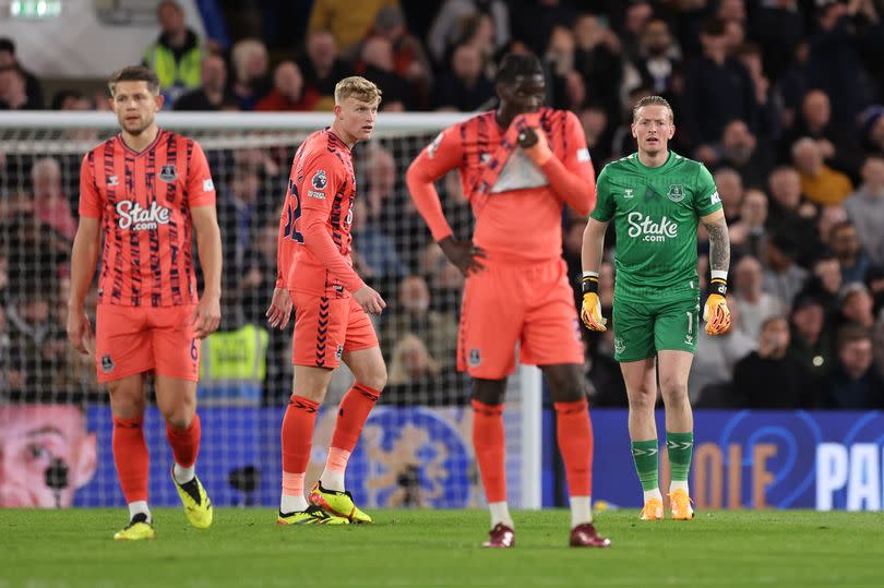 Everton players look on after conceding in the Premier League match with Chelsea