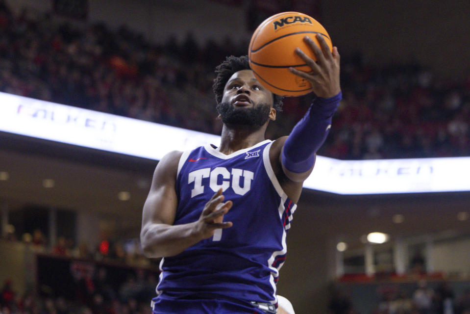 TCU's Mike Miles Jr. (1) shoots during the first half of an NCAA college basketball game against Texas Tech, Saturday, Feb. 25, 2023, in Lubbock, Texas. (AP Photo/Chase Seabolt)