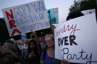 <p>Activists participate in a vigil in front of the White House on July 18, 2018, in Washington, D.C. (Photo: Alex Wong/Getty Images) </p>