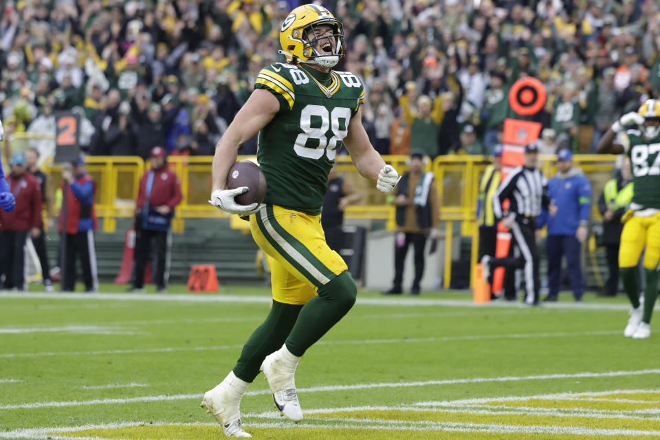 Green Bay Packers tight end Luke Musgrave (88) celebrates after scoring a 20-yard touchdown during the second half of an NFL football game against the Los Angeles Rams, Sunday, Nov. 5, 2023, in Green Bay, Wis. (AP Photo/Matt Ludtke)