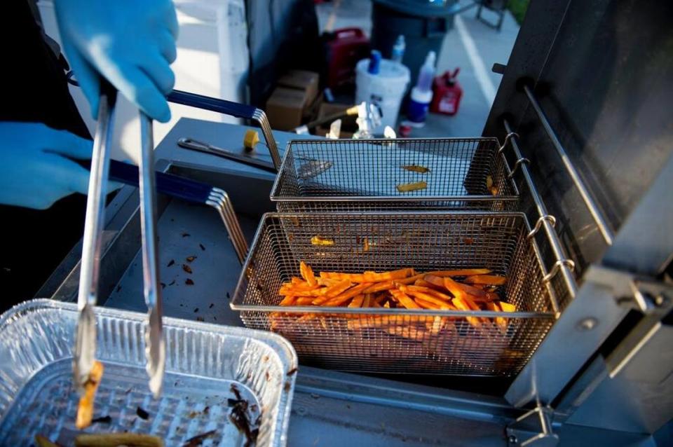 Sweet potato fries are prepared at one of the booths of the annual Livingston Sweet Potato Festival in October.