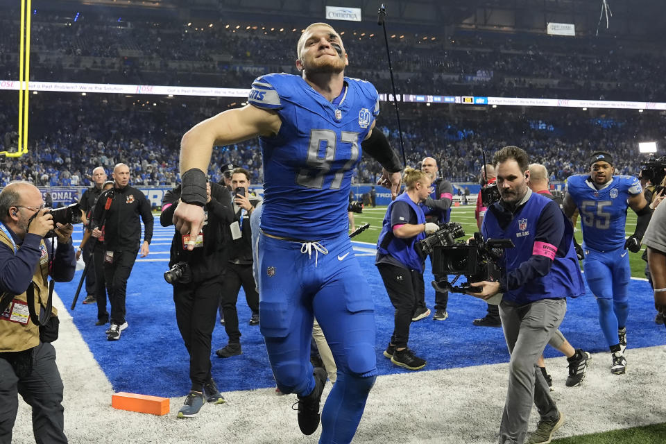 Detroit Lions defensive end Aidan Hutchinson reacts as he leaves the field following an NFL football NFC divisional playoff game against the Tampa Bay Buccaneers, Sunday, Jan. 21, 2024, in Detroit. The Lions won 31-23. (AP Photo/Paul Sancya)