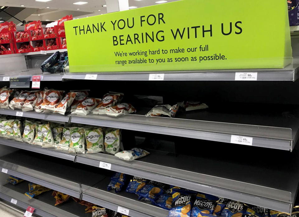 Empty crisp shelves are pictured at Waitrose supermarket, in Canary Wharf, London, Britain November 5, 2021. REUTERS/Victor Jack