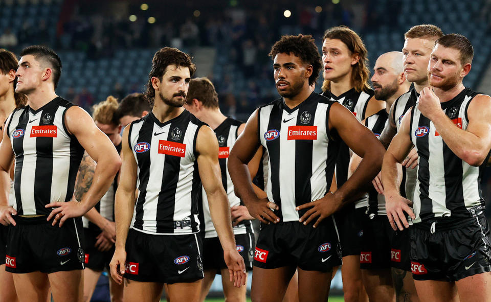 Collingwood players, pictured here after their loss to the Western Bulldogs in 2023.