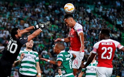 Pierre-Emerick Aubameyang battles for the ball in the air - Credit: action images