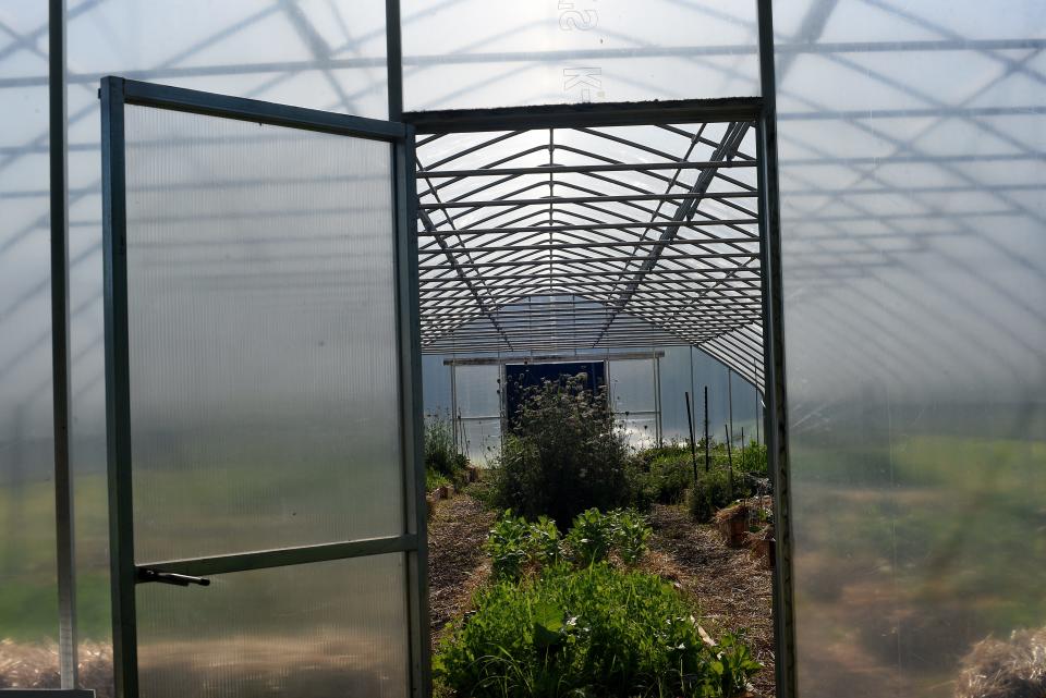 The hoops house style greenhouse on the grounds of the Learning 4 Life Farm, which provides education and job training for students on the autism spectrum.