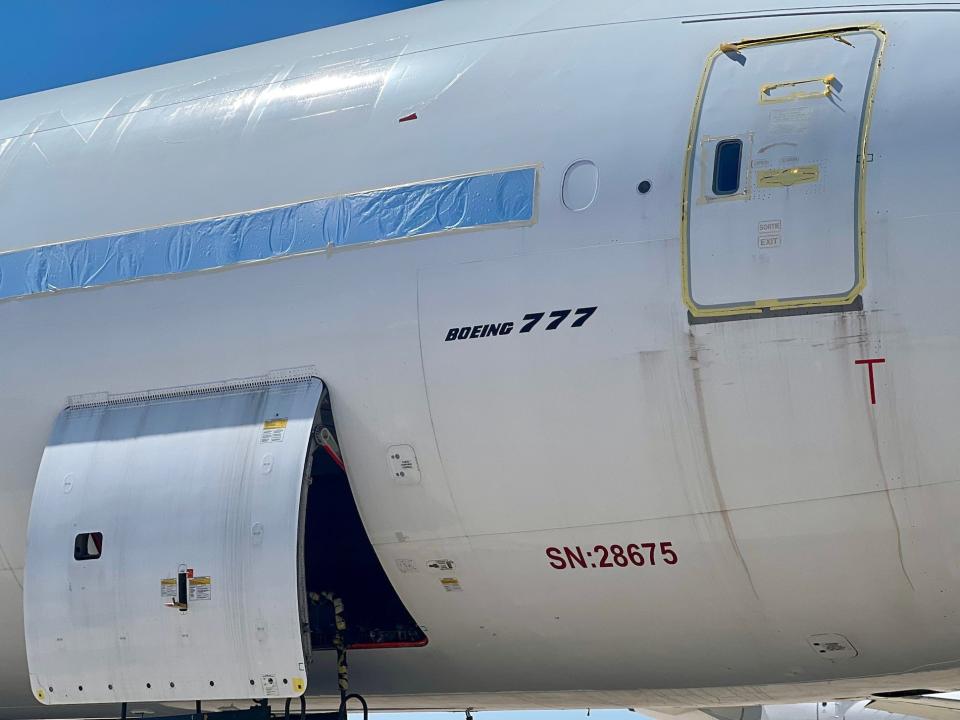 The side of a Boeing 777 at Pinal Airpark.