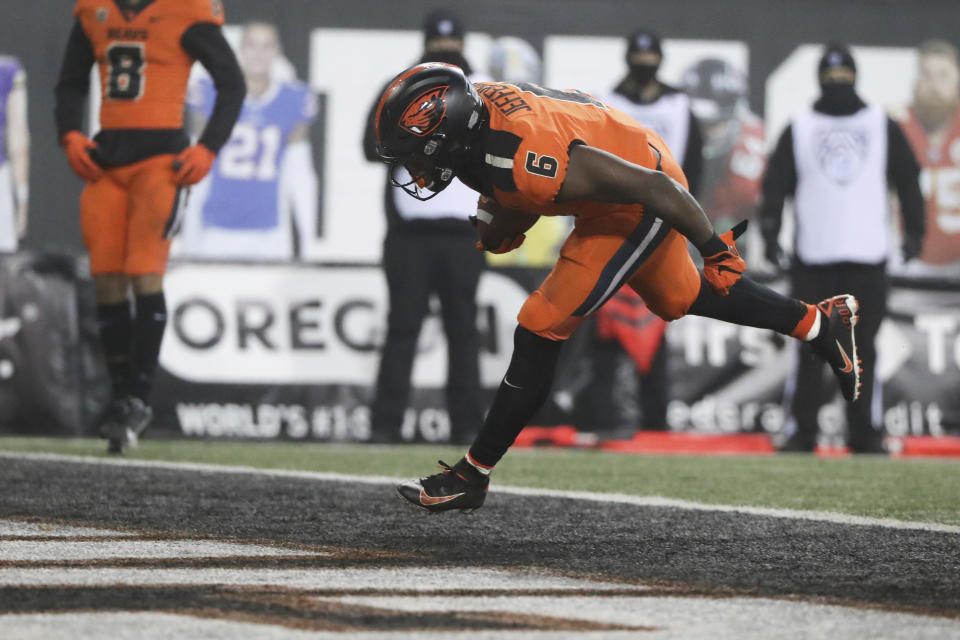Oregon State running back Jermar Jefferson scores a touchdown during the second half of an NCAA college football game against Oregon in Corvallis, Ore., Friday, Nov. 27, 2020. Oregon State won 41-38. (AP Photo/Amanda Loman)