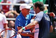 Tennis - Argentina v Italy - Davis Cup World Group First Round - Parque Sarmiento stadium, Buenos Aires, Argentina - 3/2/17. Italy's team captain Corrado Barazzutti embraces player Paolo Lorenzi after he won the match against Argentina's Guido Pella. REUTERS/Marcos Brindicci