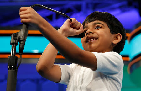 Akash Vukoti, 6, of San Angelo, TX, the youngest contestant at the 89th annual Scripps National Spelling Bee, takes his turn during a preliminary round at National Harbor in Maryland, U.S., May 25, 2016. REUTERS/Kevin Lamarque