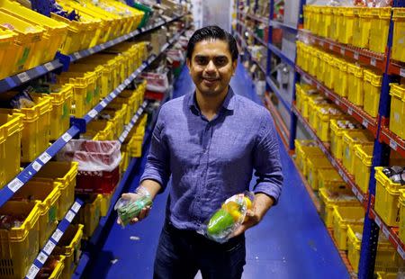 RedMart's President Vikram Rupani poses at their fulfillment centre in Singapore September 22, 2017. Picture taken September 22, 2017. REUTERS/Edgar Su