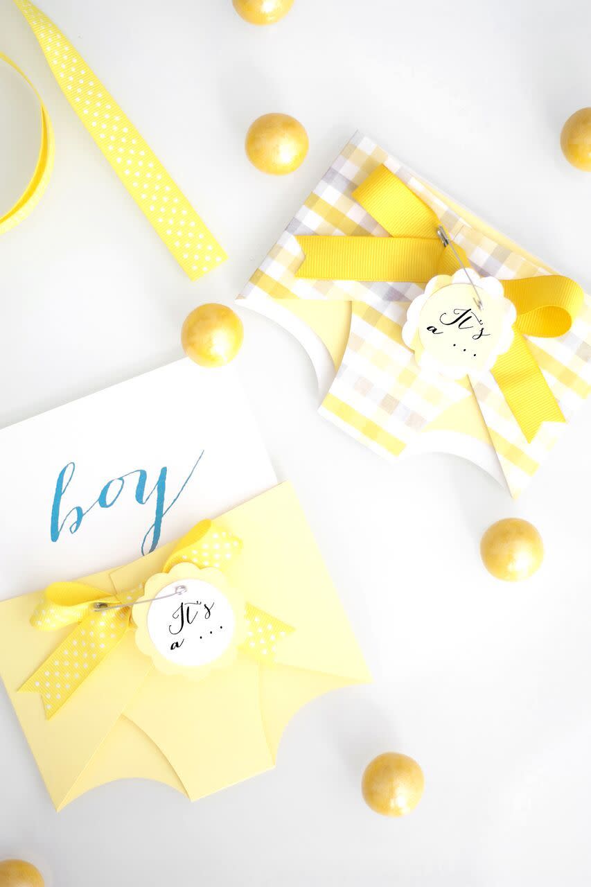 <p>Diapers never looked cuter! These DIY gender reveal diaper ballots are perfect for a cute photo op with the parents-to-be and their guests. </p><p><strong>Get the tutorial at <a href="https://www.kristimurphy.com/blog/gender-reveal-idea" rel="nofollow noopener" target="_blank" data-ylk="slk:Kristi Murphy;elm:context_link;itc:0;sec:content-canvas" class="link ">Kristi Murphy</a>.</strong></p><p><a class="link " href="https://www.amazon.com/gp/product/B0081ZRTKA/?tag=syn-yahoo-20&ascsubtag=%5Bartid%7C10050.g.30900240%5Bsrc%7Cyahoo-us" rel="nofollow noopener" target="_blank" data-ylk="slk:SHOP RIBBON;elm:context_link;itc:0;sec:content-canvas">SHOP RIBBON</a></p>