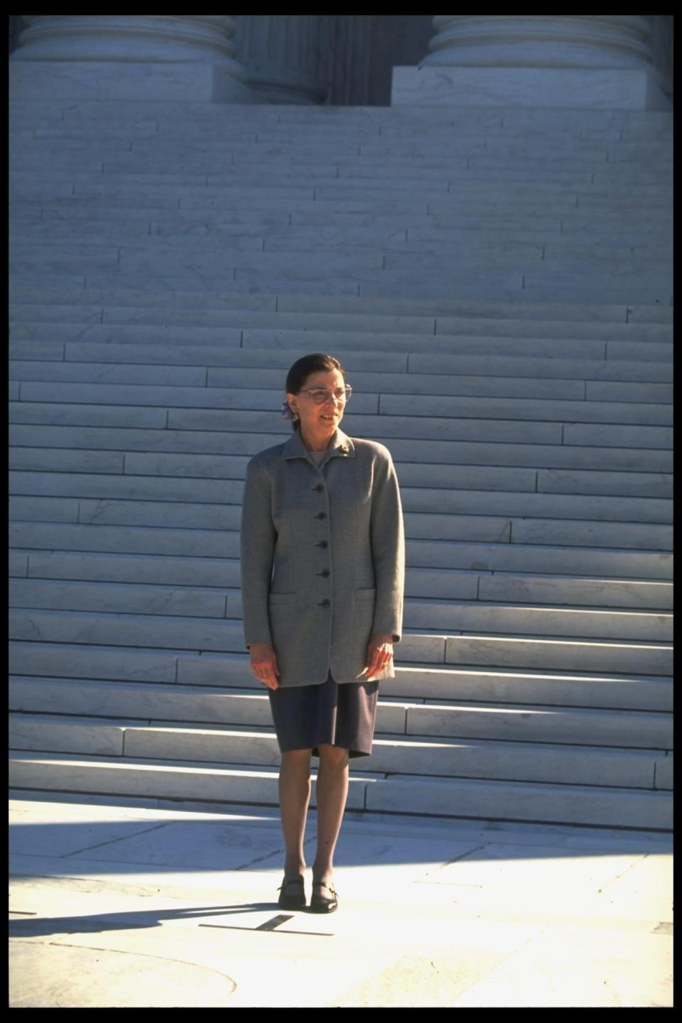 <div class="inline-image__caption"><p>Supreme Court Justice Ruth Bader Ginsburg, at the bottom of the Supreme Court building after taking her oath as the newest associate justice, October 1, 1993. Her tenure transformed the court and her career served as a beacon for women around the world.</p></div> <div class="inline-image__credit">Diana Walker/Getty</div>