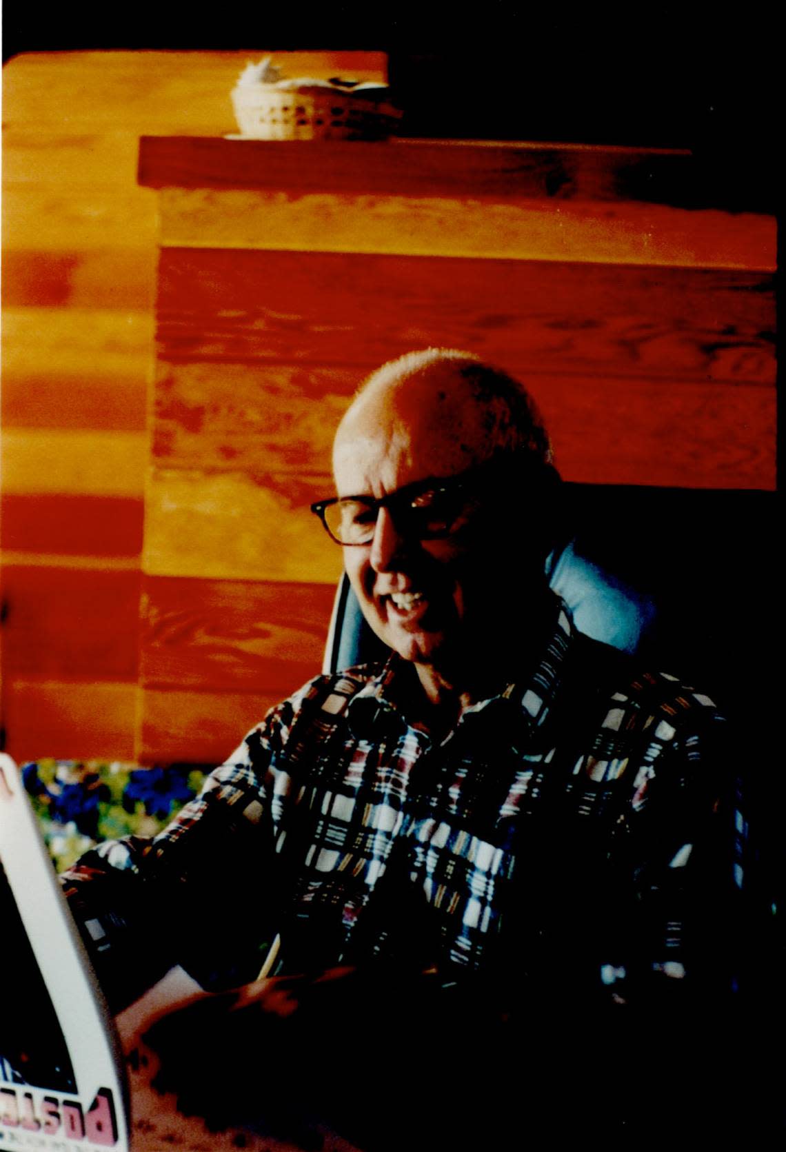 Philip Rhodes sitting in his Fripp Island, South Carolina, home. After purchasing Pritchards Island in 1979, he began building a home on Fripp Island.