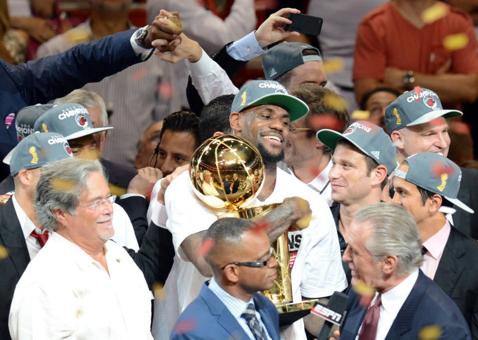 The Miami Heat LeBron James (C) celebrates victory in the NBA Finals after the NBA Finals game between the Miami Heat and the Oklahoma City Thunder June 21, 2012 at the American Airlines Arena in Miami, Florida. Miami won the series 4-1.&nbsp;