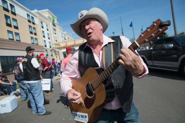 Kraig Moss sings his support for then Republican presidential candidate Donald Trump at a rally in March, 2016 in Janesville, Wisconsin