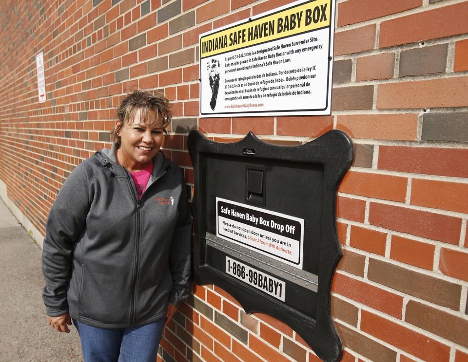 FILE — Monica Kelsey and the town of Woodburn, Ind., dedicated the first Safe Haven Baby Box of its kind on April 26, 2016, at the Woodburn Volunteer Fire Department. A fight is developing in Florida's legislature over a measure that would allow fire stations and hospitals to install boxes where distressed mothers could leave their unwanted newborns. The Indiana-based group Safe Haven Baby Boxes is pushing the measure. It passed the House recently and is now before the Senate, where there is an attempt to block it. (Chad Ryan/The Journal Gazette via AP, File)