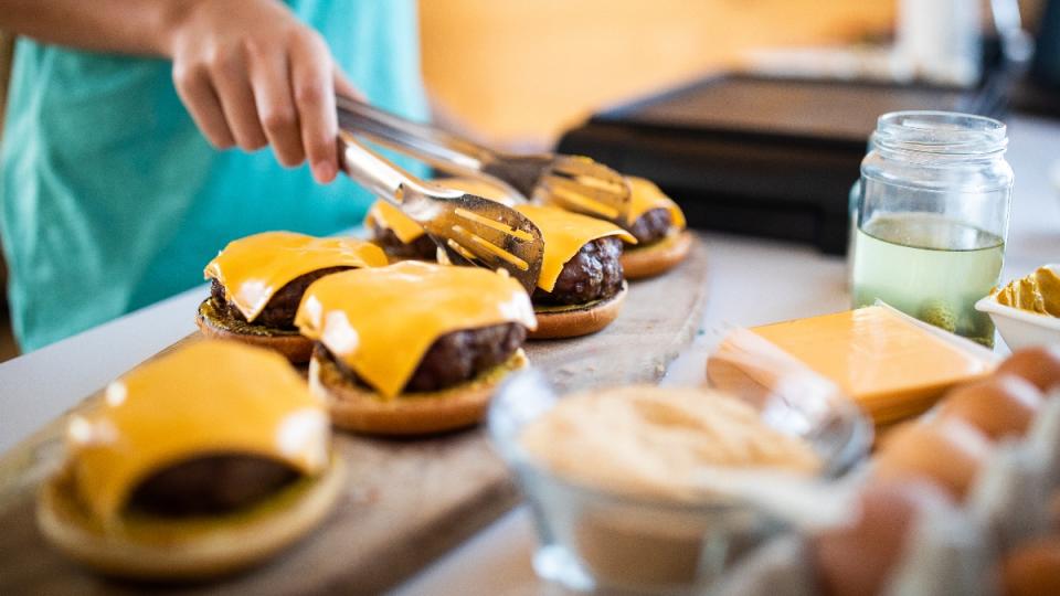 Burgers topped with American cheese