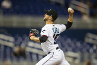 Miami Marlins relief pitcher Dylan Floro (36) delivers a pitch during the ninth inning of a baseball game against the Washington Nationals on Thursday, June 24, 2021, in Miami. (AP Photo/Mary Holt)