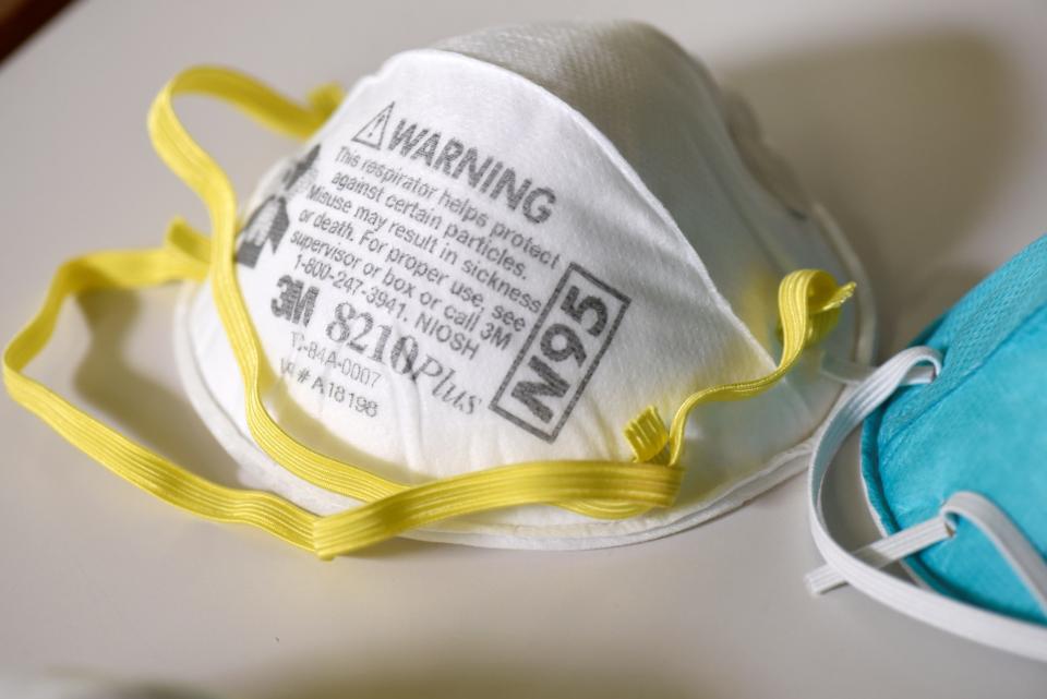 FILE PHOTO: Various N95 respiration masks at a laboratory of 3M, which has been contracted by the U.S. government to produce extra masks in response to the country's novel coronavirus outbreak, in Maplewood, Minnesota, U.S. March 4, 2020. REUTERS/Nicholas Pfosi/File Photo