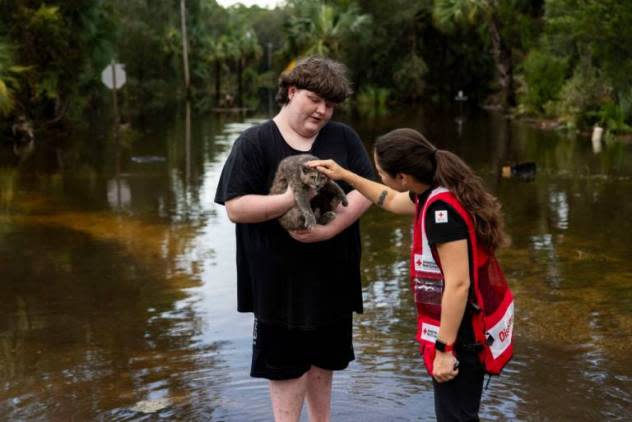 Layne Padgett, 17, felt relief when rescuing his beloved cat, Muffin, after his family's home was flooded by the storm surge caused by Hurricane Idalia in Steinhatchee, Florida. (Scott Dalton/American Red Cross)