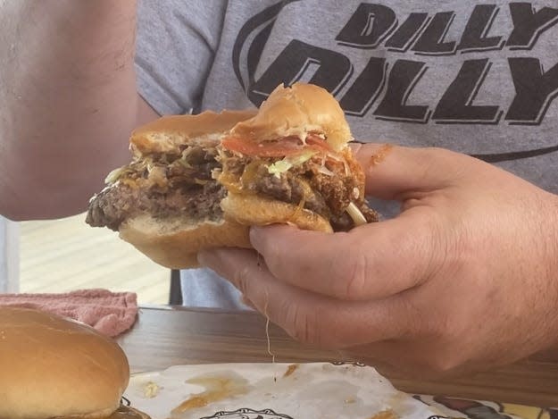 guy's burger joint megan's dad eating chili burger