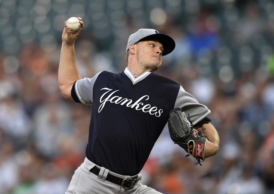 New York Yankees starting pitcher Sonny Gray delivers a pitch during the first inning of the second baseball game of a split doubleheader against the Baltimore Orioles, Saturday, Aug. 25, 2018, in Baltimore. (AP Photo/Nick Wass)