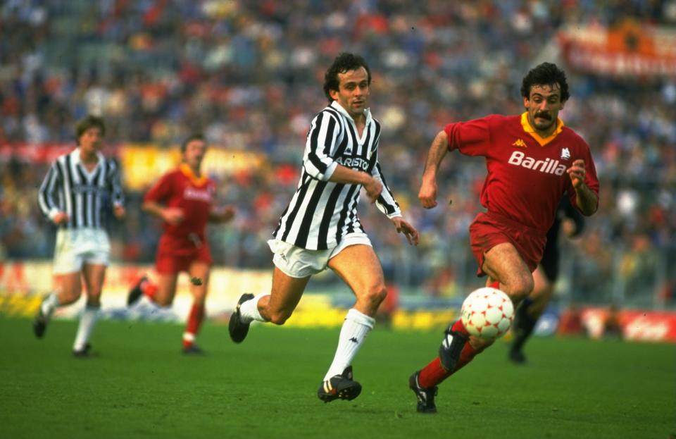 Undated:  Michel Platini (left) of Juventus chases Emidio Oddi of Roma  during an Italian League match at the Olympic Stadium in Rome. Roma won the match 3-0. \ Mandatory Credit: Allsport UK /Allsport