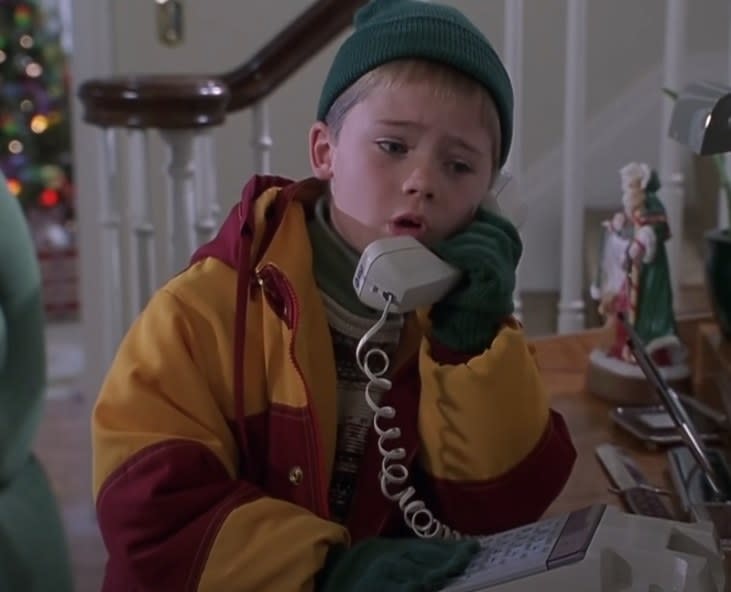 Jake Lloyd as Jamie on the phone with his dad