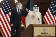 Kuwaiti Foreign Minister Sheikh Ahmad Nasser Al-Mohammad Al-Sabah and U.S. Secretary of State Antony Blinken arrive for a joint news conference at the Ministry of Foreign Affairs in Kuwait City, Kuwait, Thursday, July 29, 2021. (Jonathan Ernst/Pool via AP)