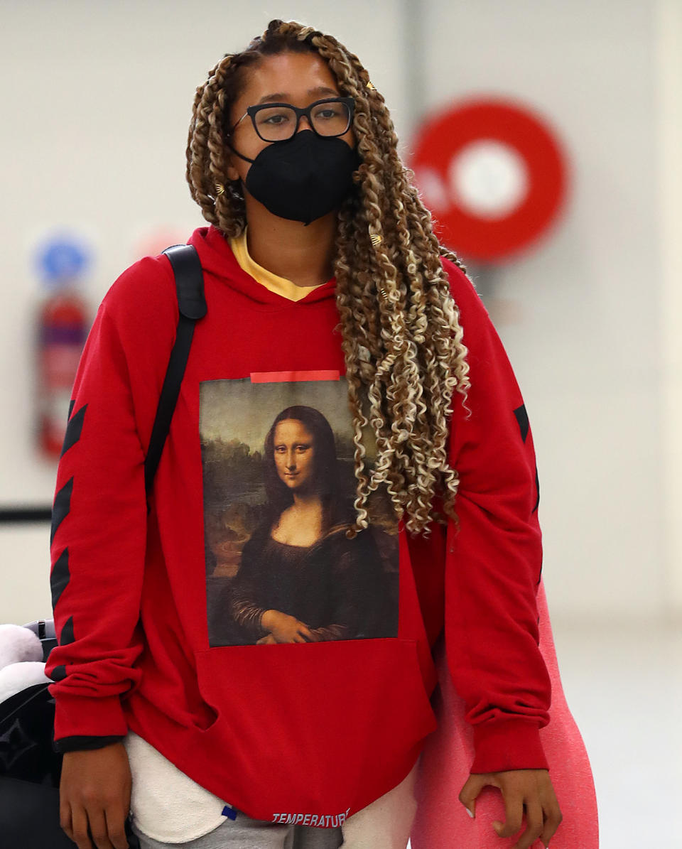 <p>Naomi Osaka lands at the Melbourne airport ahead of the 2022 tennis season on Dec. 28 in Australia. </p>