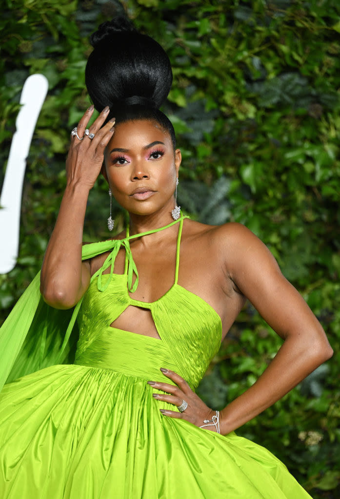 Gabrielle is wearing a gorgeous lime green gown at the fashion awards in the UK