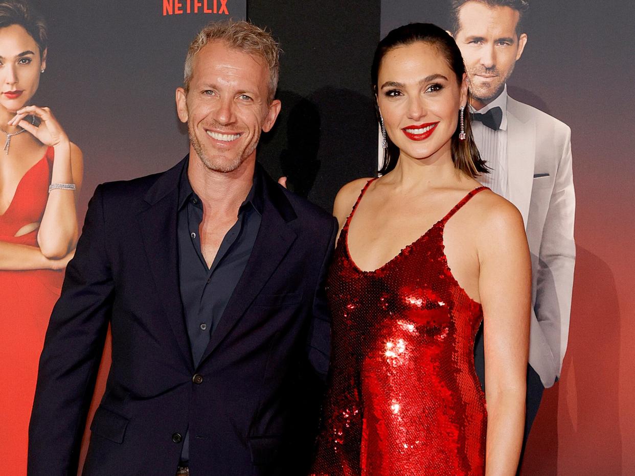 Yaron Varsano (L) and Gal Gadot attend the World Premiere Of Netflix's "Red Notice" at L.A. LIVE on November 03, 2021 in Los Angeles, California