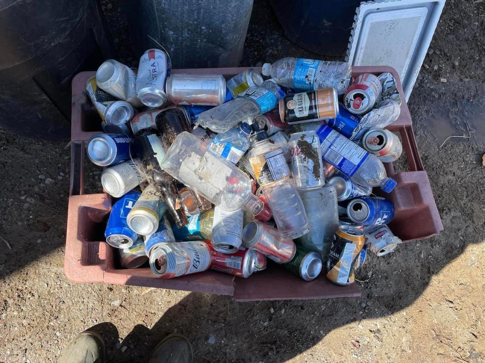 The couple cleaned up 117 alcoholic beverage containers that likely accumulated over a one-year period.