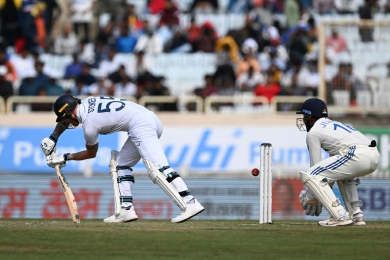 England's Ben Stokes (L) is bowled by India's Kuldeep Yadav during the third day of the fourth Test (TAUSEEF MUSTAFA)