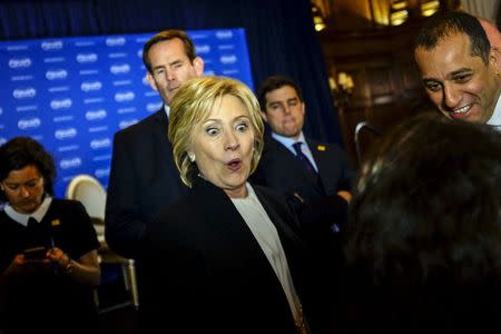 U.S. Democratic presidential candidate and former Secretary of State Hillary Clinton greets supporters after delivering the keynote address at the Brookings Institution Saban Forum at the Willard Hotel in Washington December 6, 2015. REUTERS/James Lawler Duggan