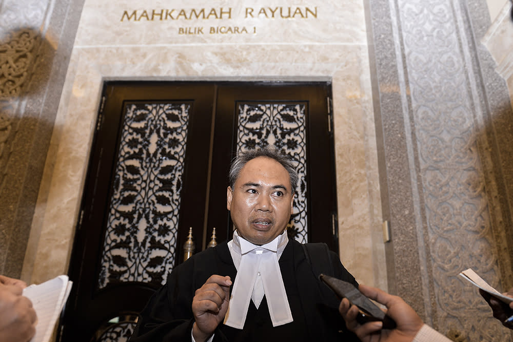 Lawyer Arham Rahimy Hariri speaks to reporters at the Court of Appeal in Putrajaya June 25, 2019. — Picture by Miera Zulyana