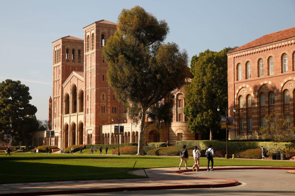 Students walking across a courtyard on UCLA campus