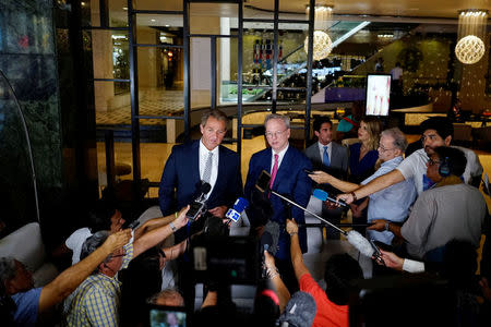 U.S. Senator Jeff Flake (L) and former Google CEO Eric Emerson Schmidt speak to journalists during a news conference in Havana, Cuba, June 4, 2018. REUTERS/Alexandre Meneghini