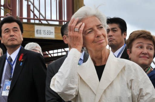 International Monetary Fund (IMF) managing director Christine Lagarde visit tsunami disaster-stricken areas in a coastal district in Sendai. Catastrophes like Japan's 2011 tsunami cost the world more than $3.5 trillion over the last 30 years, a conference heard, as the World Bank called for better disaster planning