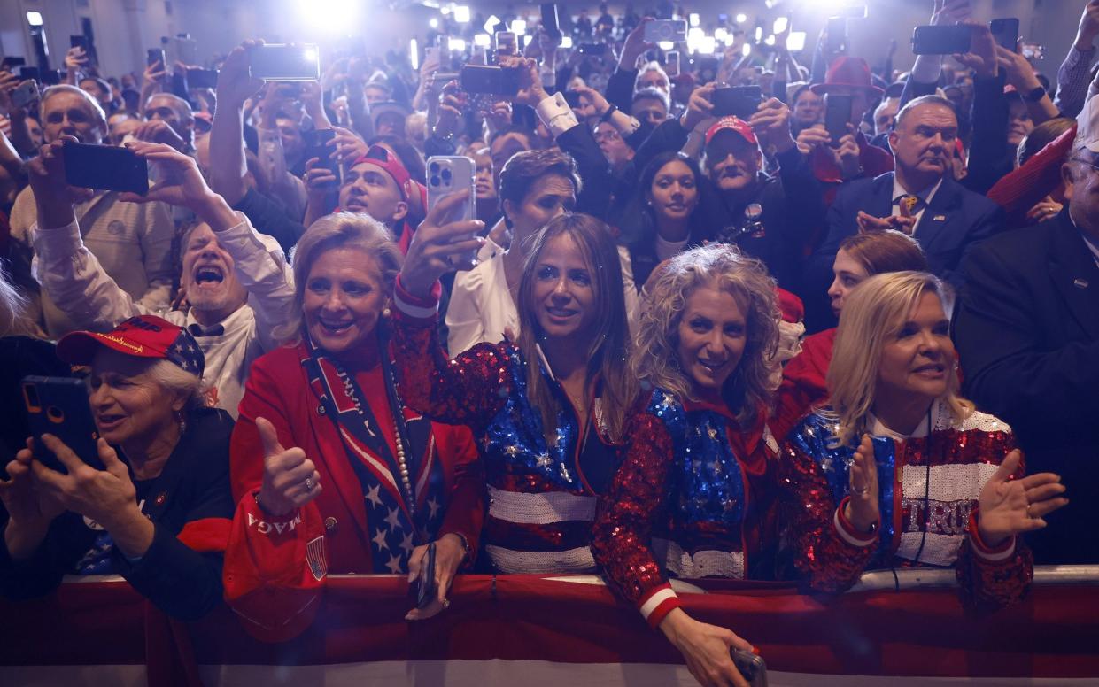 Trump supporters cheer for him in New Hampshire during his primary night rally