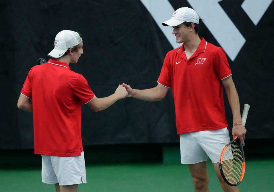 Neenah's Satchel Moss, left, and Ben Kotchen compete in the WIAA boys individual state tennis tournament June 2 in Madison. Moss and Kotchen will play in the state team tournament this weekend with their Rockets teammates.